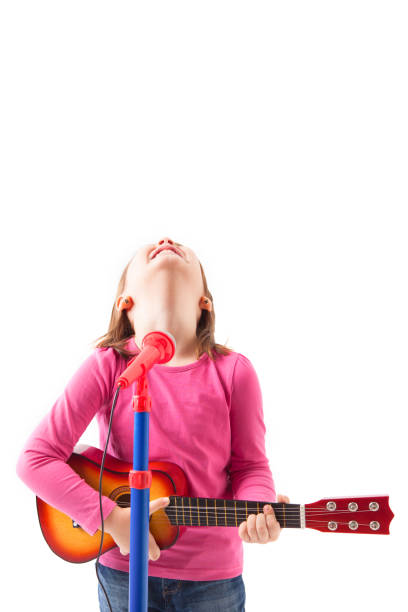 istock Happy little girl singing 642816786
