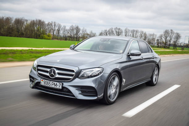 2016 Mercedes-Benz E-class Minsk, Belarus - April 21, 2016: 2016 model year Mercedes-Benz E220d. The new E-Class is engineered to deliver more comfort, more efficiency and a more connected drive than ever before. mercedes benz photos stock pictures, royalty-free photos & images