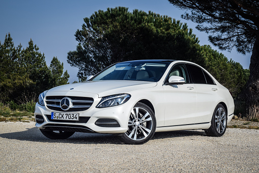 Marseille, France - March 19, 2014: Mercedes-Benz C-Class 2014-2015 model (W205) at test-drive on March 6 in Marseille, France. It is the first car to use all-new Modular Rear-wheel drive Architecture. Eye-catching looks. Innovative technology. Extraordinary comfort. Remarkable efficiency. The Mercedes-Benz C-Class Saloon combines all these and more to provide an exceptional driving experience.