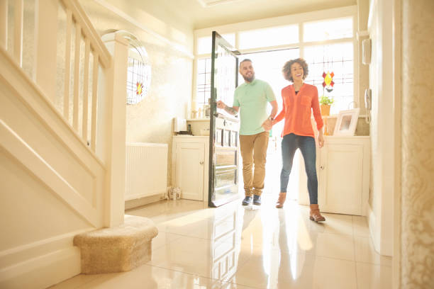istock excited couple entering a rental property 642840588