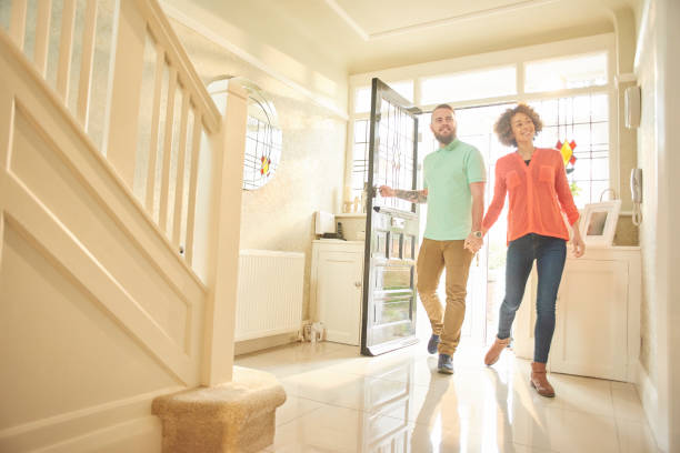 istock excited couple with keys to new home 642840652