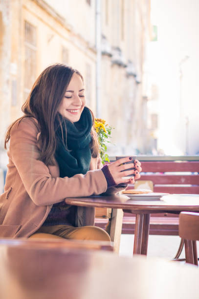 istock beautiful girl drinking coffee 642841338