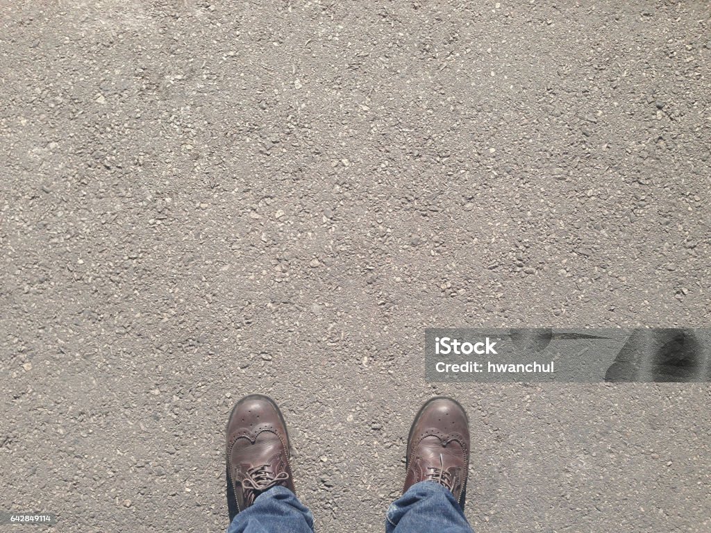 Man standing on the street Man standing on the street with copy space Sidewalk Stock Photo