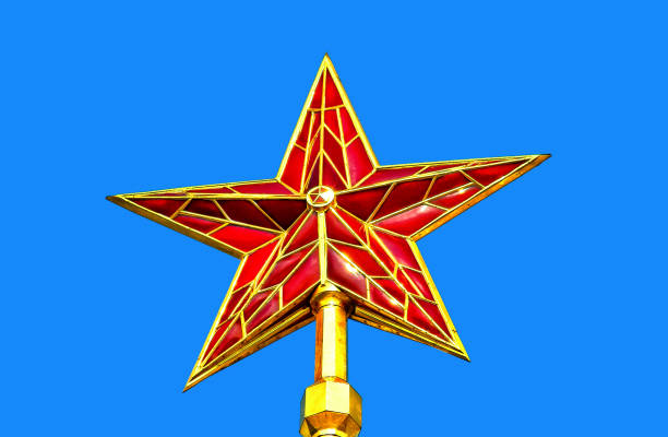 istock Red ruby star of Moscow Kremlin tower against the blue sky 642850546