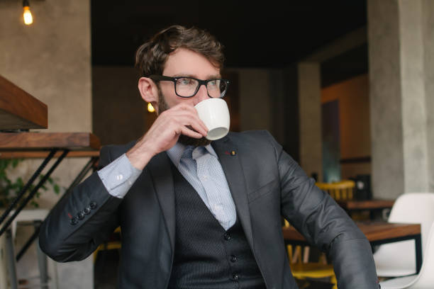 istock Fashionable man at the cafe 642859460