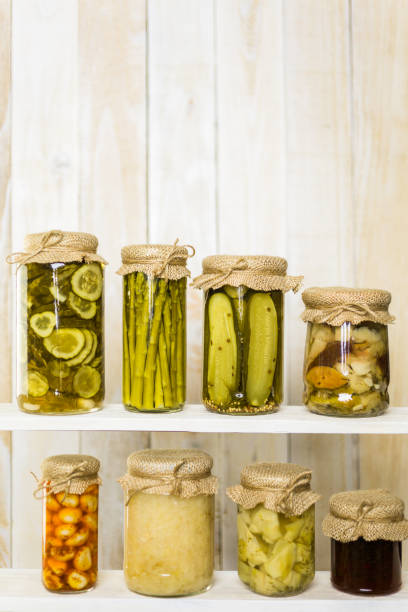 istock organic vegetables in glass jars 642862474