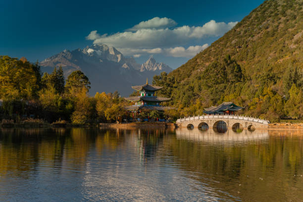 istock Temple with lake and bridge, Lijiang, China 642862650