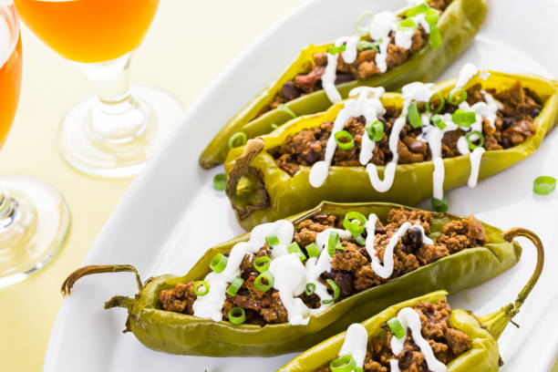 istock Chipotle beef & bean stuffed chili peppers 642863188