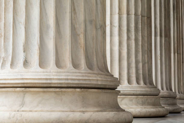 Colonnade of  Ionic order columns, close up. Colonnade of  Ionic order columns, close up. colonnade stock pictures, royalty-free photos & images