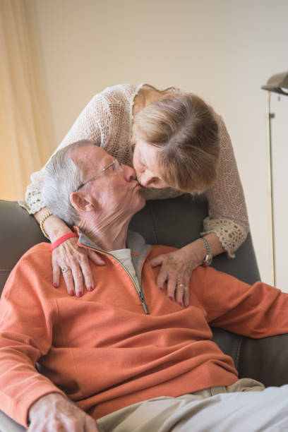 istock Kissing Seniors 642879422