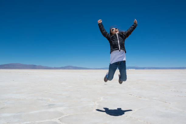 istock Child jump on Salinas Grandes 642881884