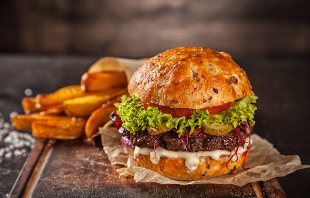 istock Home made hamburger with lettuce and cheese 642882196
