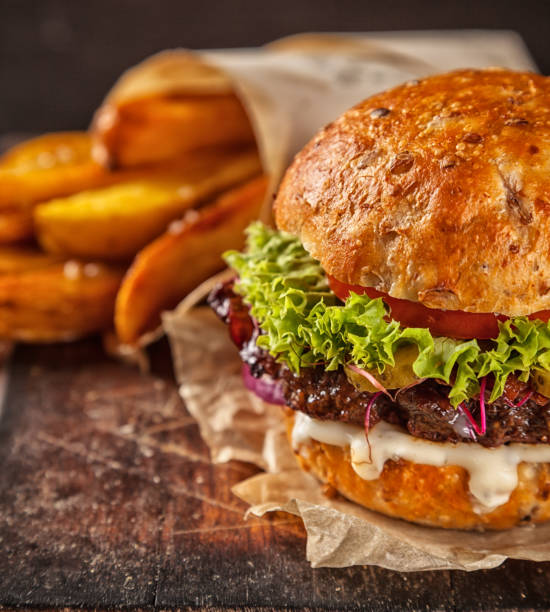 istock Home made hamburger with lettuce and cheese 642882576