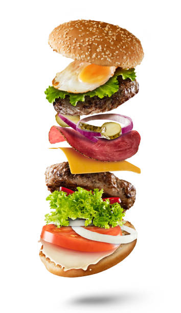 istock Maxi hamburger with flying ingredients on white background 642884674