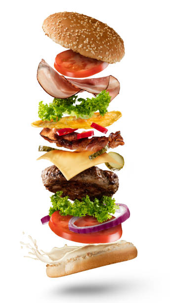 istock Maxi hamburger with flying ingredients on white background 642885222