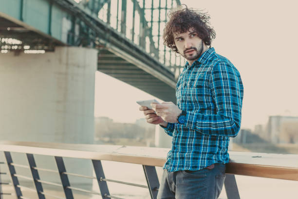 istock Photo of a handsome businessman using tablet 642886174