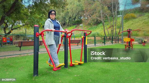 Middle Aged Woman Works Out An Air Walker Stock Photo - Download Image Now - Active Lifestyle, Adult, Adults Only