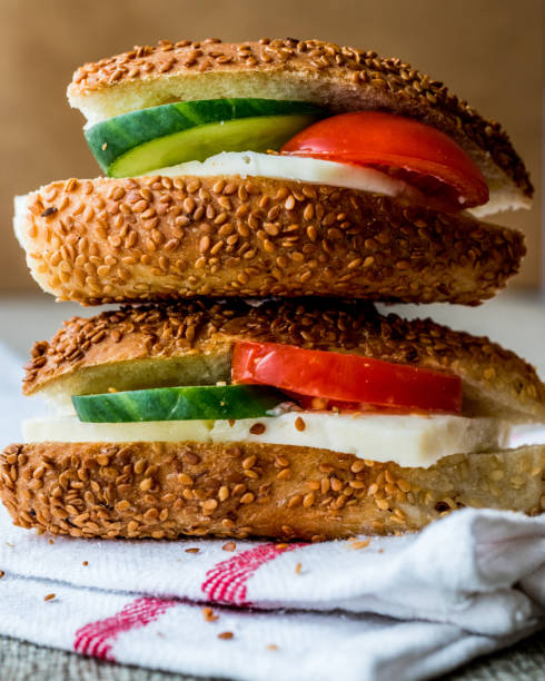 istock Turkish Bagel Simit Sandwich with cheese, tomato and cucumber. 642905312