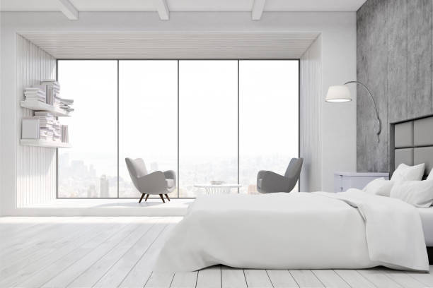 istock Bedroom with armchairs and big window 642911700