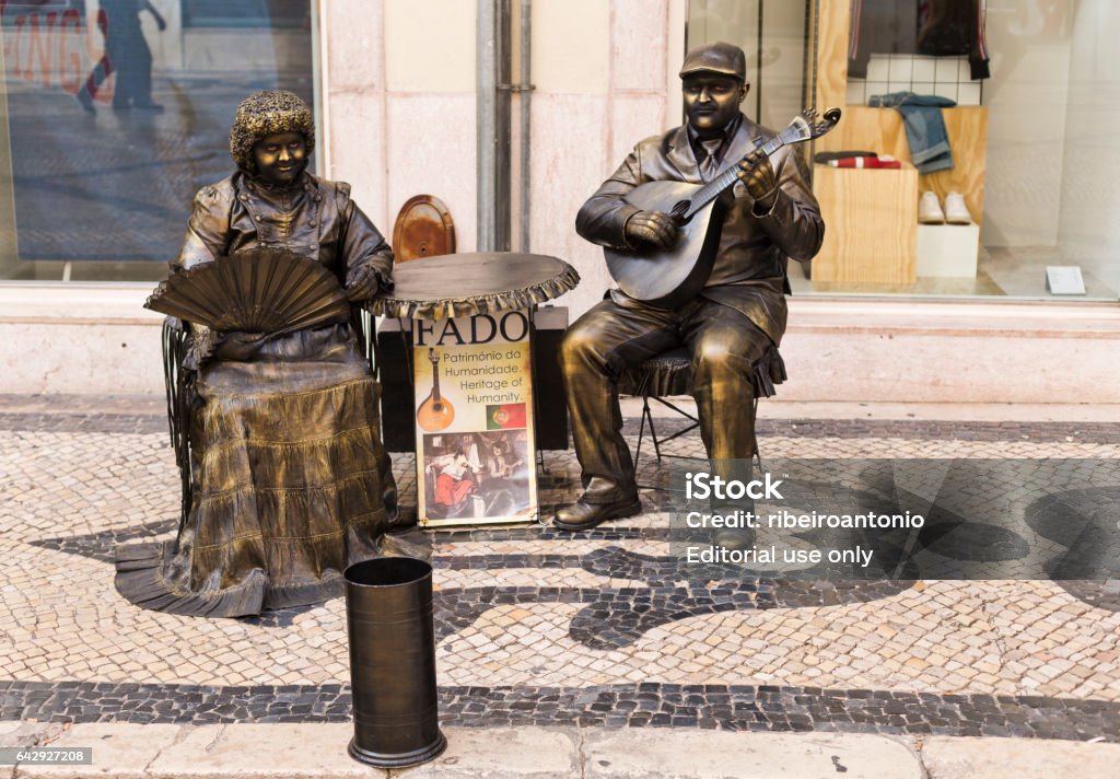 Living Statue in Lisbon Living statues impersonating Fado, the Portuguese national song, in downtown Lisbon, Portugal Fado Stock Photo