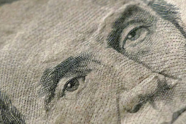 istock Part of Five Dollar Bill Macro Shot 642929782