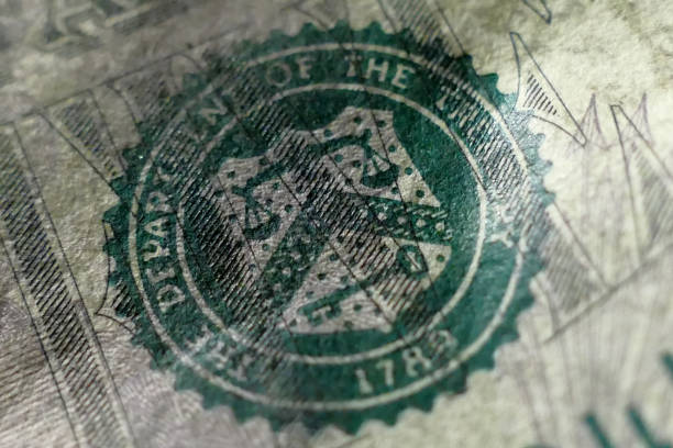 istock Part of Five Dollar Bill Macro Shot 642929832