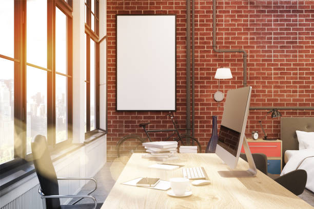 istock Home office with brick walls and poster, toned 642933358