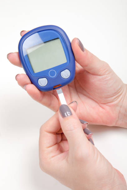istock Close-up Of Woman Hands Testing High Blood Sugar With Glucometer 642949302