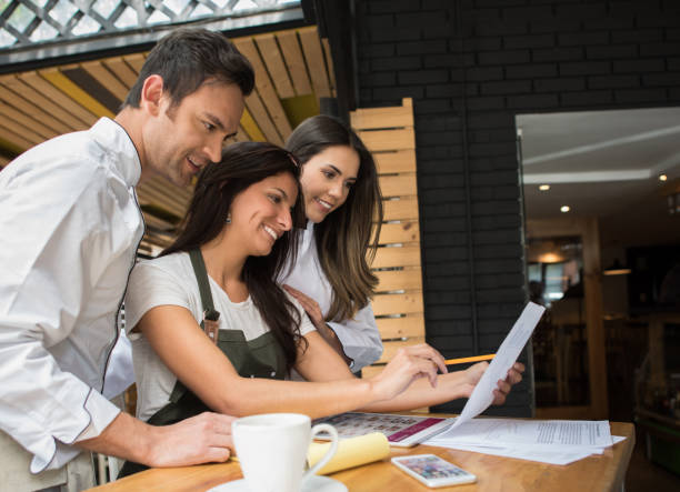 istock Staff working on a business plan at a restaurant 642958636