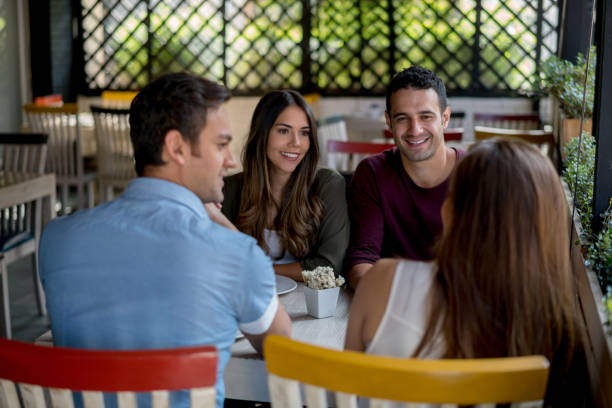 istock Group of friends eating at a restaurant 642958698