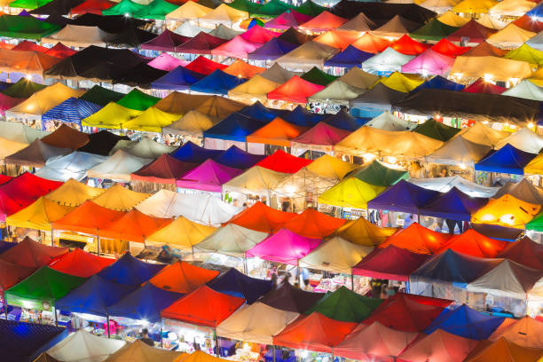 istock Top view multiple colour city night free market 642960944