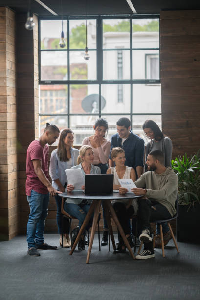 istock Happy business group at the office 642962028