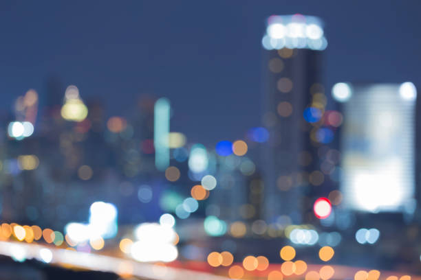 istock Blurred bokeh light city building night view 642970722