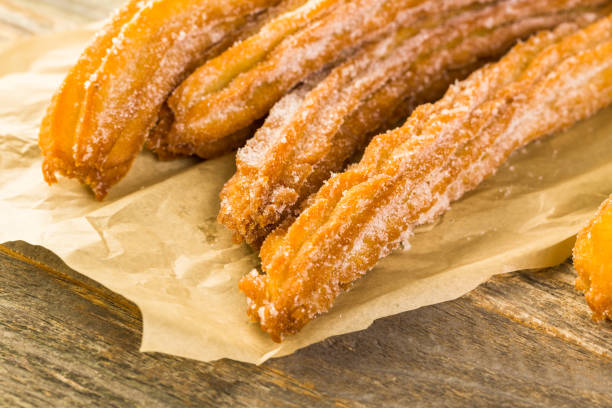 istock Bunch of curros covered with granulated sugar 642978178