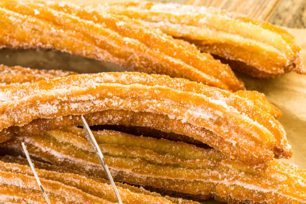 istock Bunch of curros covered with granulated sugar 642978200