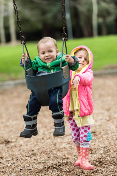 istock children playing at a playground 642986986