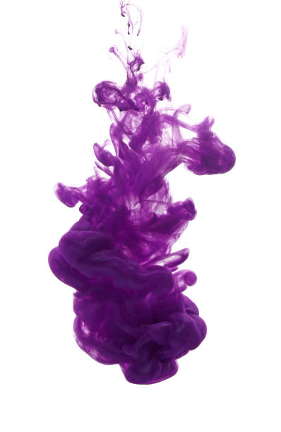 istock Color cloud of ink in water isolated on white 642998206