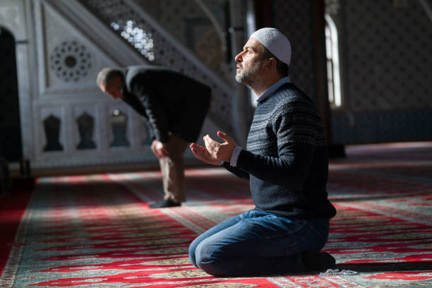 istock Muslims prayer in mosque 643001538