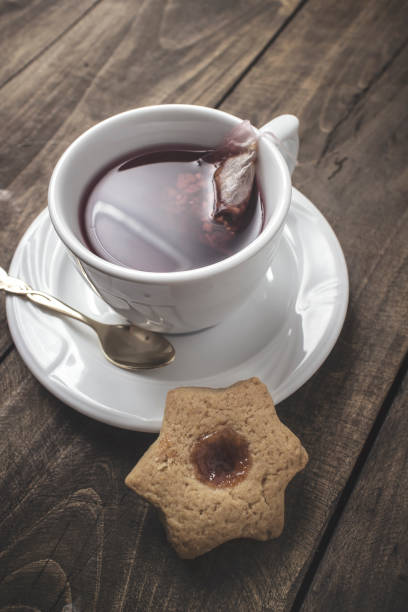 istock Fresh cookie with fruit jelly and tea cup 643005080