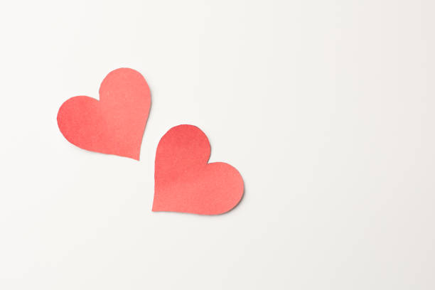 istock Red paper heart on white background 643005362