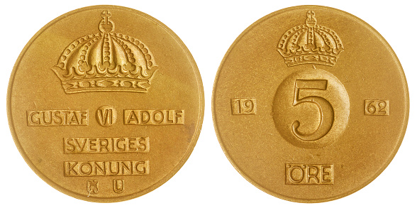 Danish 2 kroner coin with crowns and a hole in the center.