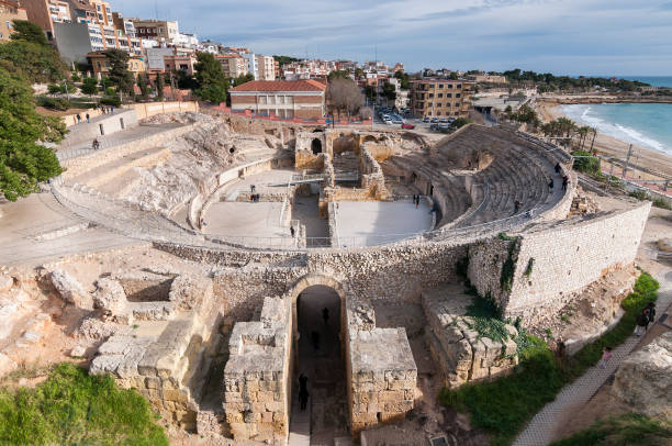 Tarragona, Catalonia, Spain - January, 3, 2016: View of roman amphitheatre ruins in Tarragona. Part of Unesco World Heritage sites.