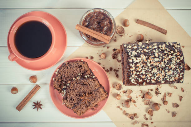 istock Dark cake with chocolate, cocoa and plum jam, coffee 643018246