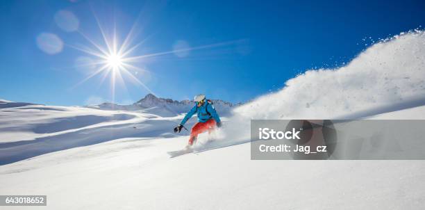 Freerider Snowboarder Running Downhill Stock Photo - Download Image Now - Snowboarding, Snowboard, Winter