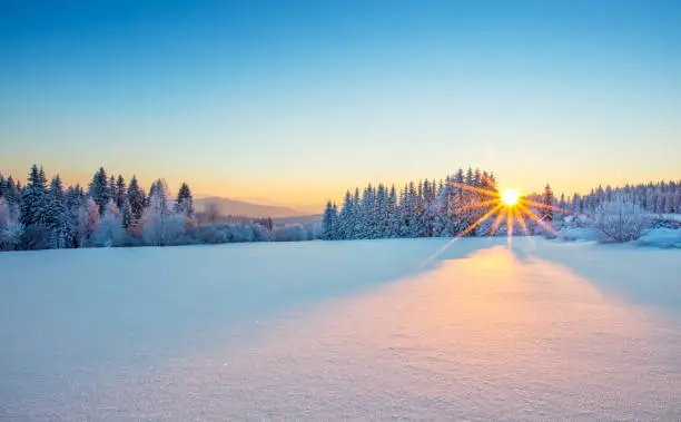 Majestic sunrise in the winter mountains landscape. High resolution image