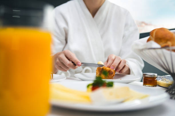 istock Woman Having Breakfast In Bed 643028358