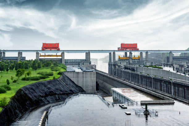 the Three Gorges Dam at Yangtze River in China at evening time China Yangtze River Three Gorges Dam in the rain. sluice photos stock pictures, royalty-free photos & images