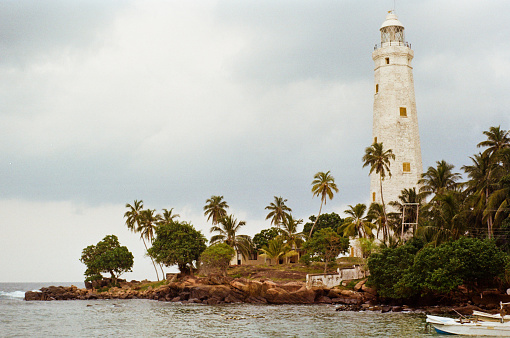 Scenic view of lighthouse on cape  in Sri Lanka
