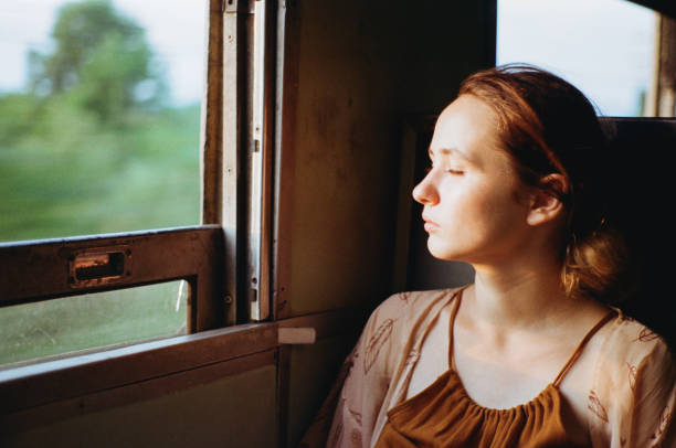 istock Woman traveling by train in Thailand 643032432