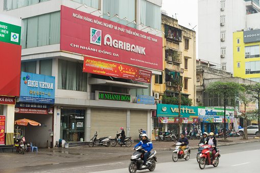 Hanoi, Vietnam - Mar 15, 2015: Exterior view of Agribank office in Xa Dan street. Agribank is the largest bank in Viet Nam in terms of capital, assets, workforce, operating network and customer base